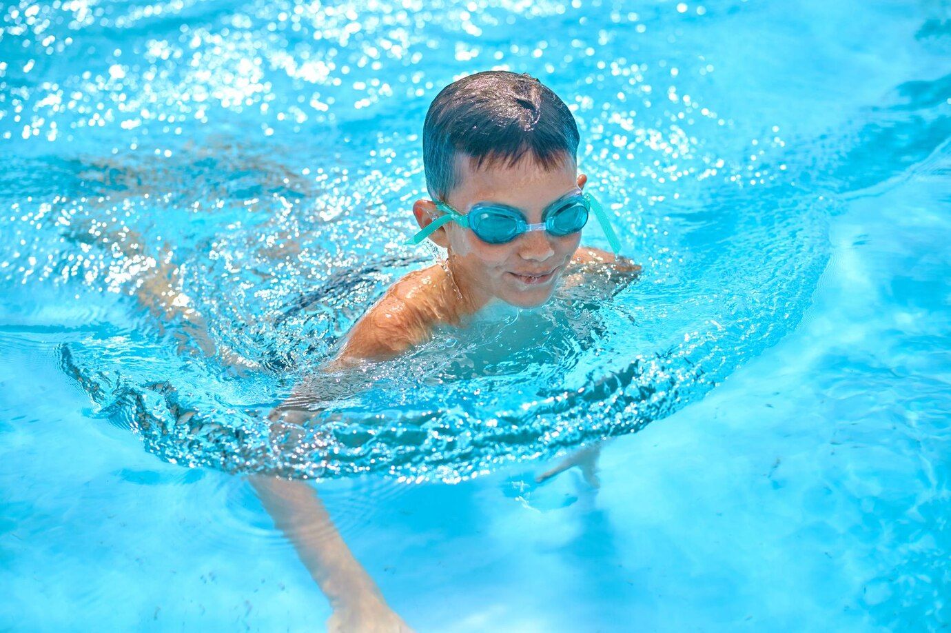 boy-goggles-swimming-pool_259150-60549.jpg