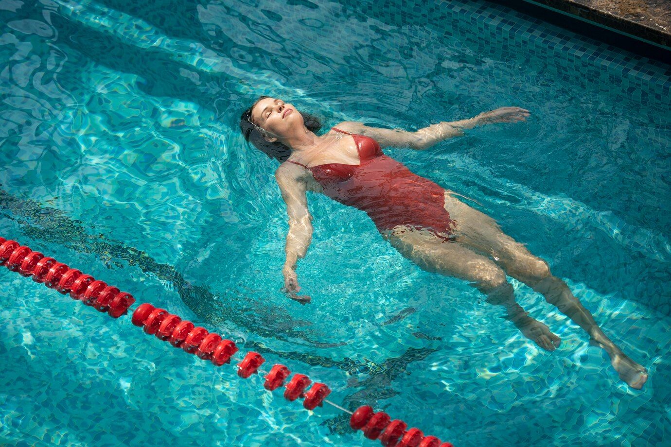 medium-shot-relaxed-woman-pool_23-2149089273.jpg