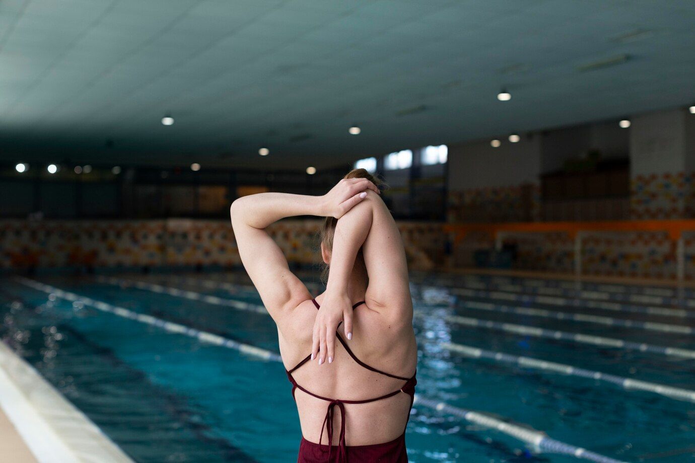 medium-shot-woman-stretching-arm_23-2149028319.jpg