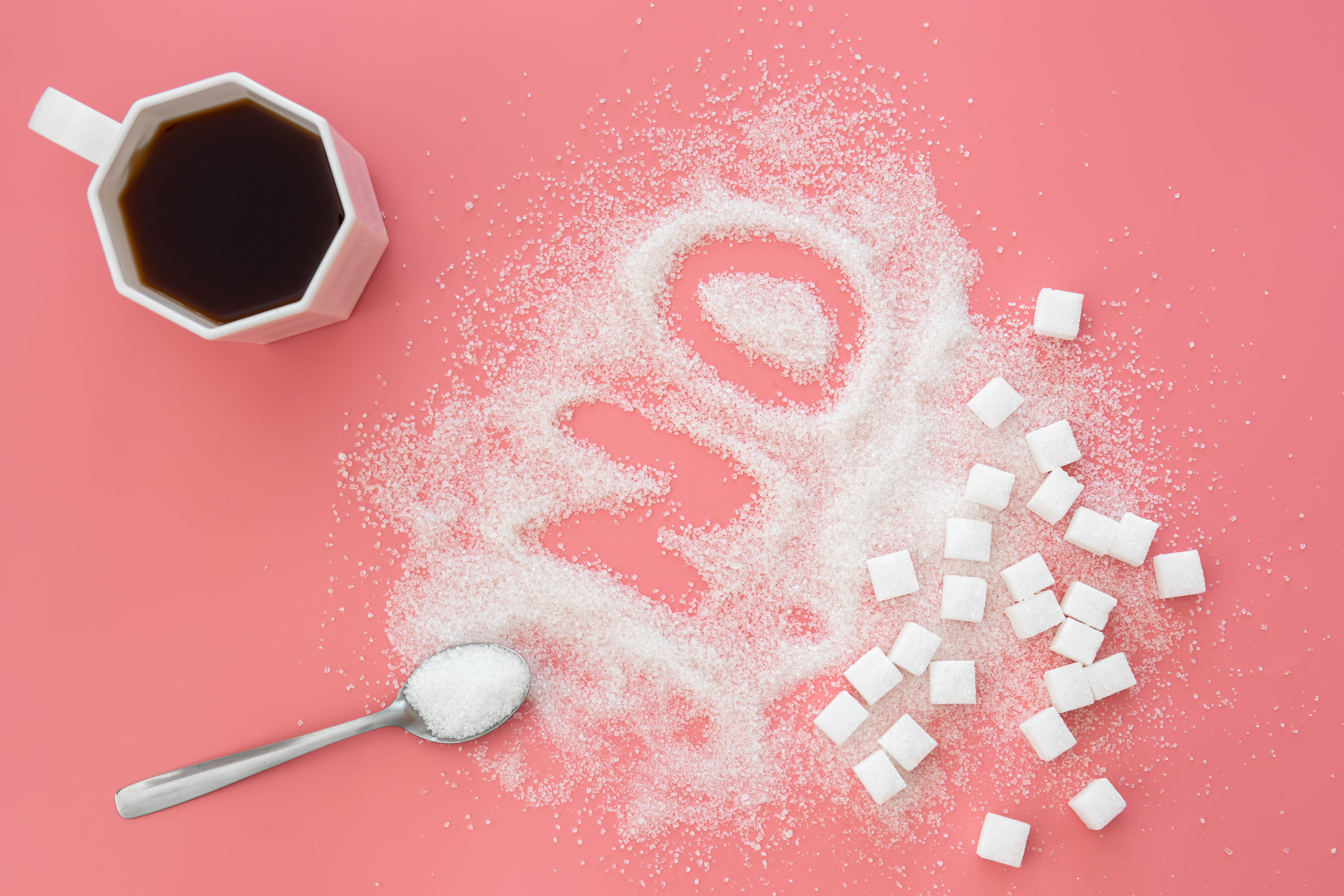 word-no-made-sugar-cup-coffee-pink-background-flat-lay.jpg