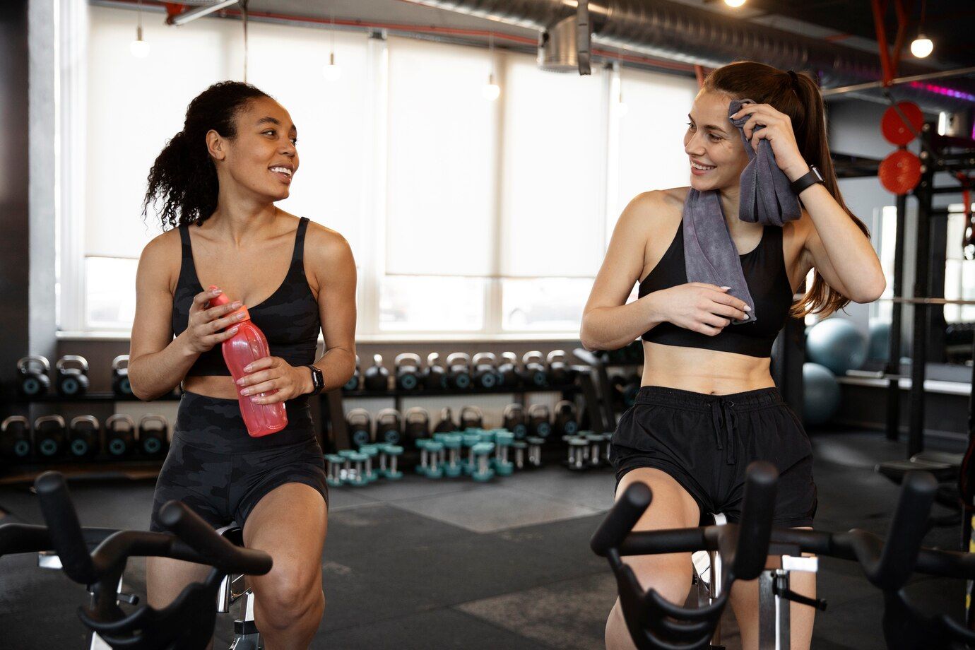 young-women-taking-part-spinning-class_23-2149332054.jpg